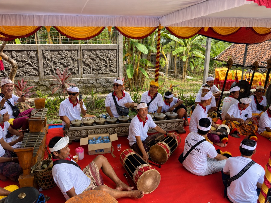 Local gamelan musicians gathered near Villa Hola Agung during a community ceremony
